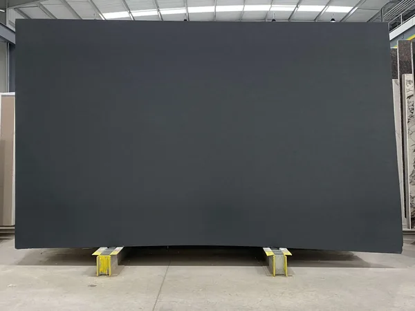 Honed Absolute Black granite slab on supports